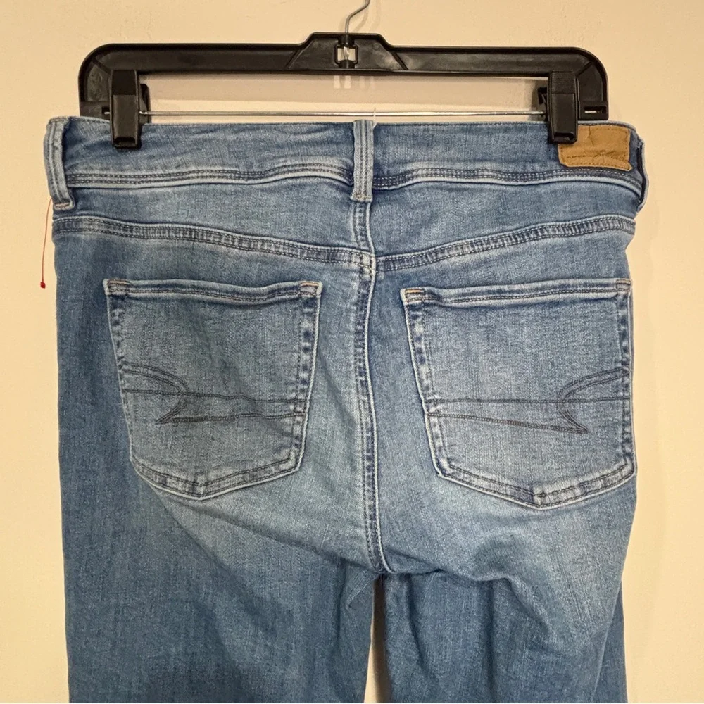 American Eagle Next Level Stretch High Rise Kick Boot Jeans in Light Wash Denim - Picture 4 of 12